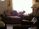 A bright shot of the comfy living room of our new home.